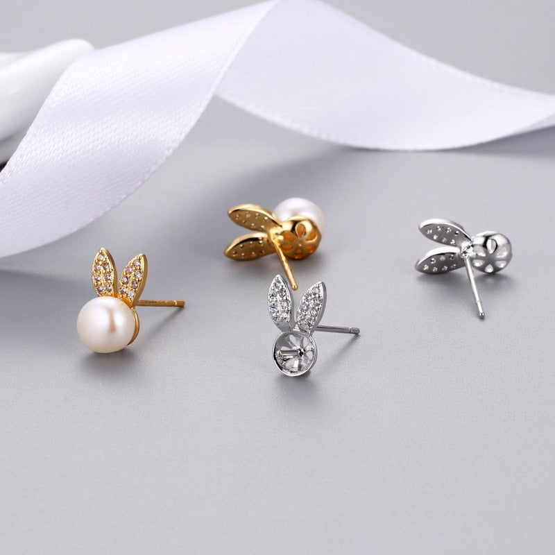 Gold- and silver-tone rabbit zircon stud earrings with round white pearls