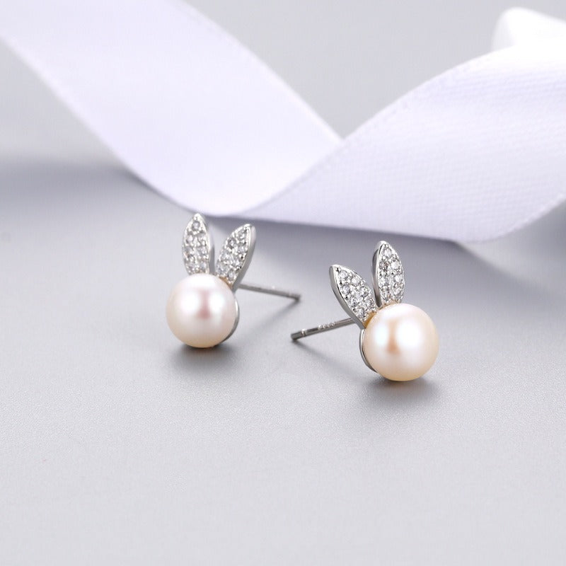 Silver-tone rabbit zircon stud earrings with round white pearl drops