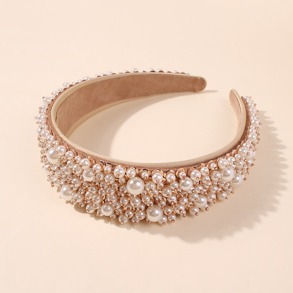 White faux pearl fringe headband with rounded beige inner band and dense bead drape