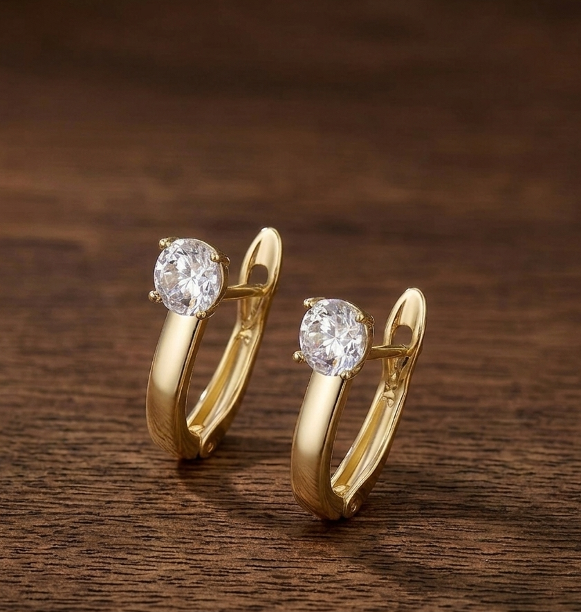 Light gold hoop earrings with white round solitaire stone