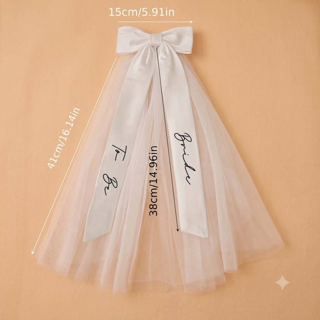 White bow veil with tulle layers and printed script; size 15 x 41 cm