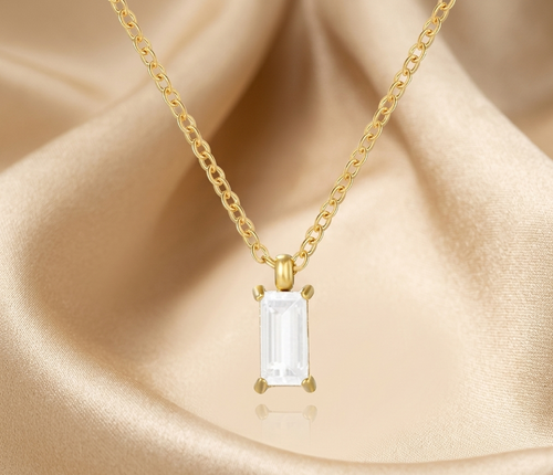 Gold-tone statement necklace with baguette drop crystal pendant on link chain