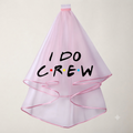 Light pink hen party veil with 'I DO CREW' text and pink trim