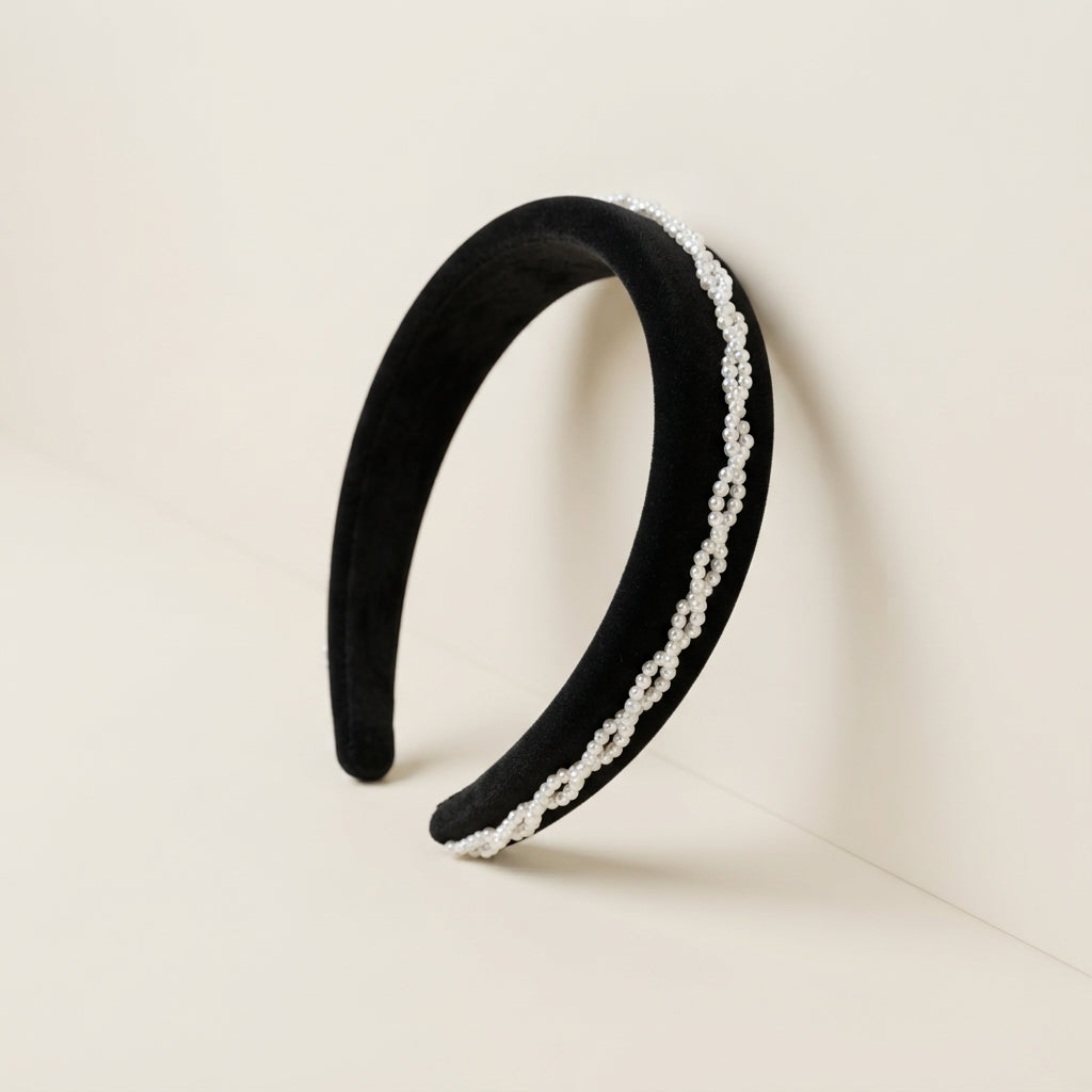 Black velvet twist bridal headband with a pearl strand along the band edge