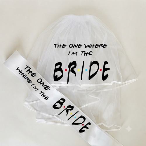 White tulle bride veil and diagonal satin sash with “Bride” print