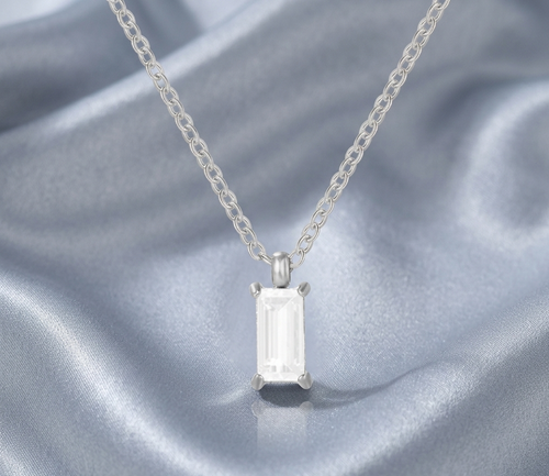 Silver-tone statement necklace with baguette drop crystal pendant and prong setting