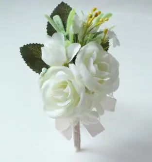 Silk botanical groom's lapel pin with cluster of white roses and green leaves, burlap stem
