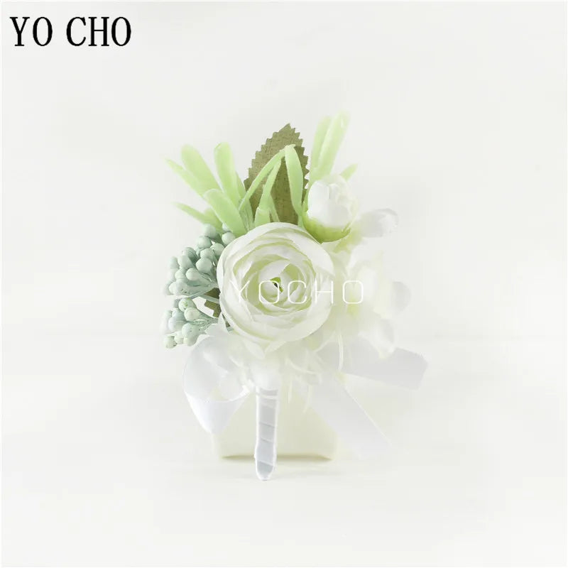 Silk botanical groom's lapel pin with white rose, green berry accents, and burlap stem