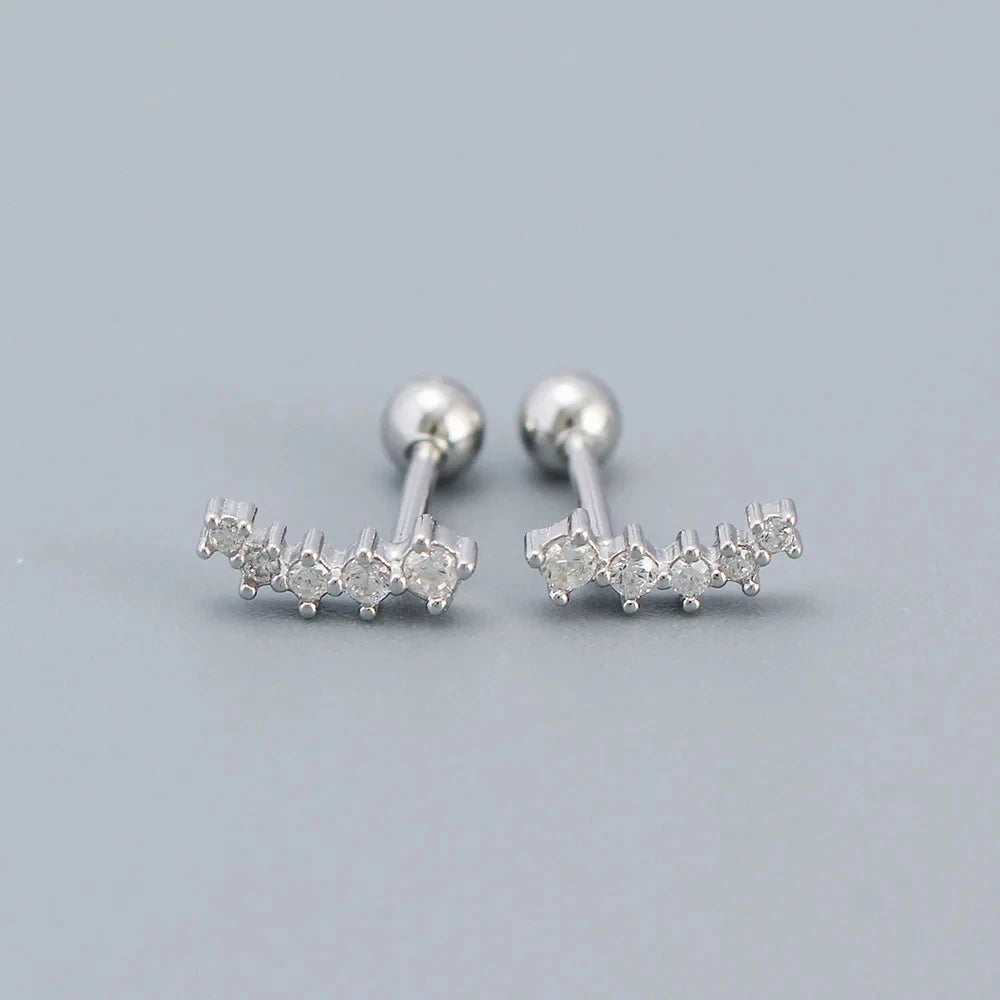Silver-tone huggie hoop earrings with rhinestone bar charm