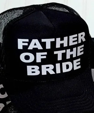 Black mesh trucker cap with bold white text: FATHER OF THE BRIDE