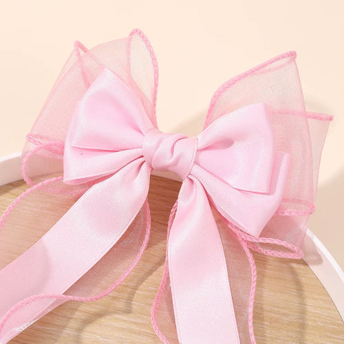 Pink ribbon bow hair clip with sheer mesh layered tails