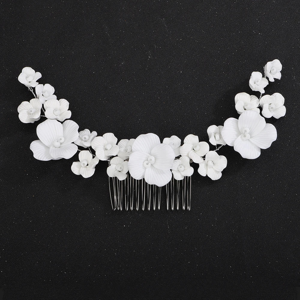 Bridal cascading orchid hair comb with white floral blossoms and silver-tone comb base