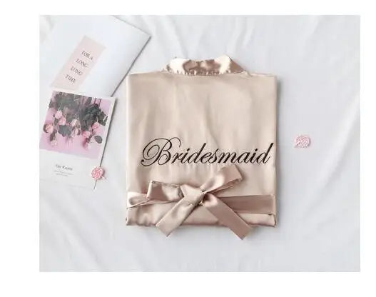 Champagne satin robe with embroidered “Bridesmaid” and front waist ribbon bow