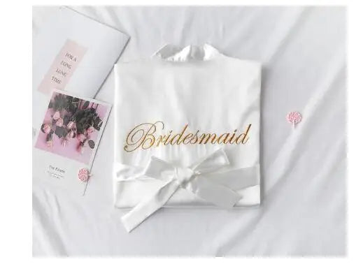 White satin robe with embroidered “Bridesmaid” and front waist bow