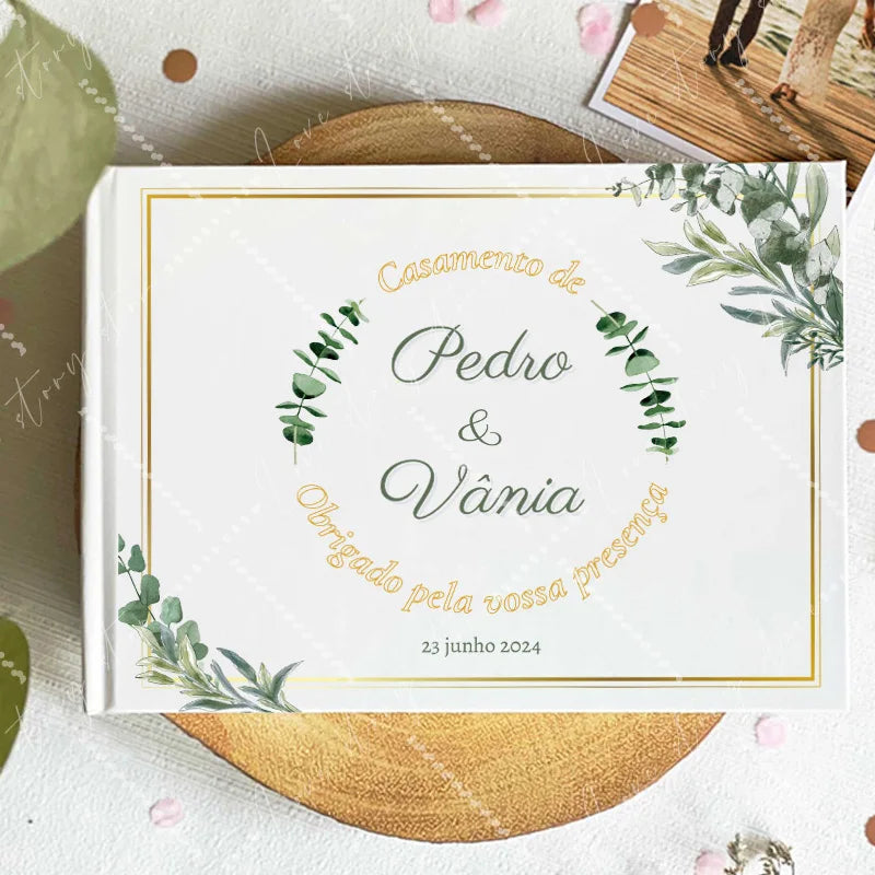 Wedding guest book cover with green olive wreath and couple names; date 23 June 2024