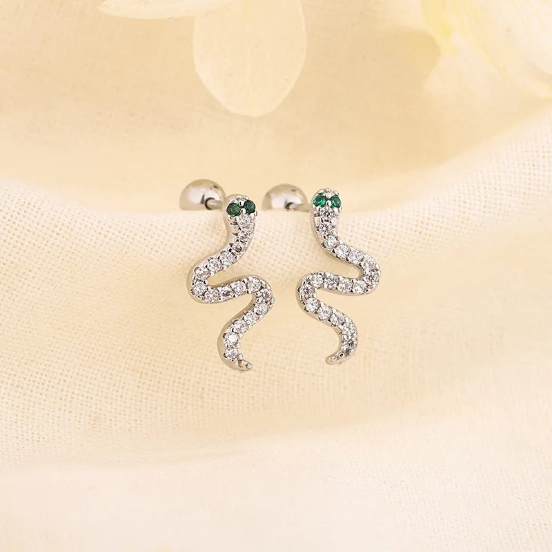 Silver huggie hoop earrings with long ribbon crystal design and round ball posts