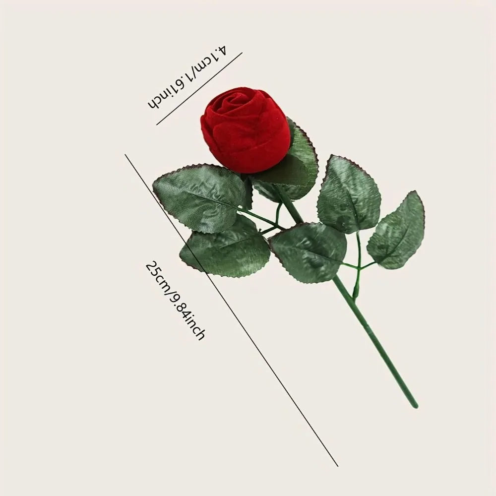 Red velvet rosebud ring box with green leaves; diagram shows 25 cm length