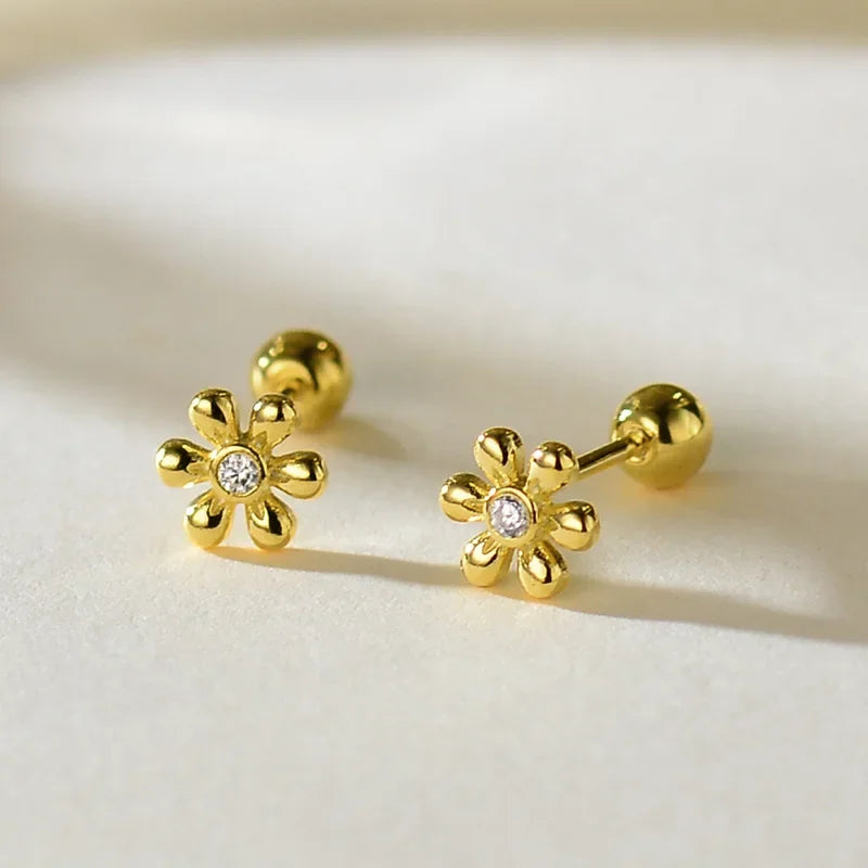 Gold-tone daisy flower zircon stud earrings with round crystal centers