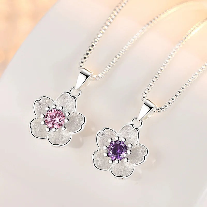 925 sterling silver flower pendant necklace with pink and purple crystal center