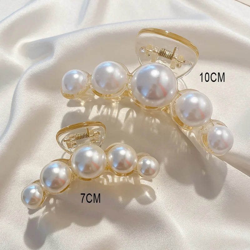 Pearl claw hair clip set, gold-tone clips with white faux pearls; ~10cm and ~7cm.