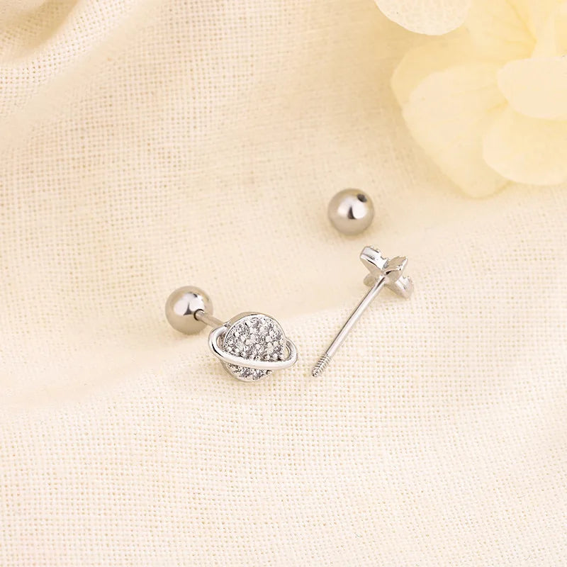Silver huggie hoop earrings with heart-shaped crystal cluster and round ball post