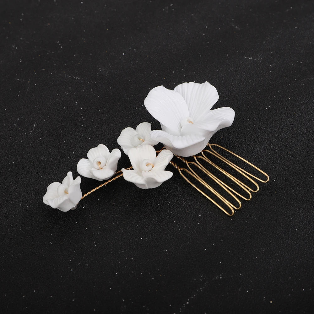 Bridal hair comb with white orchid flower and gold-tone wavy pin comb