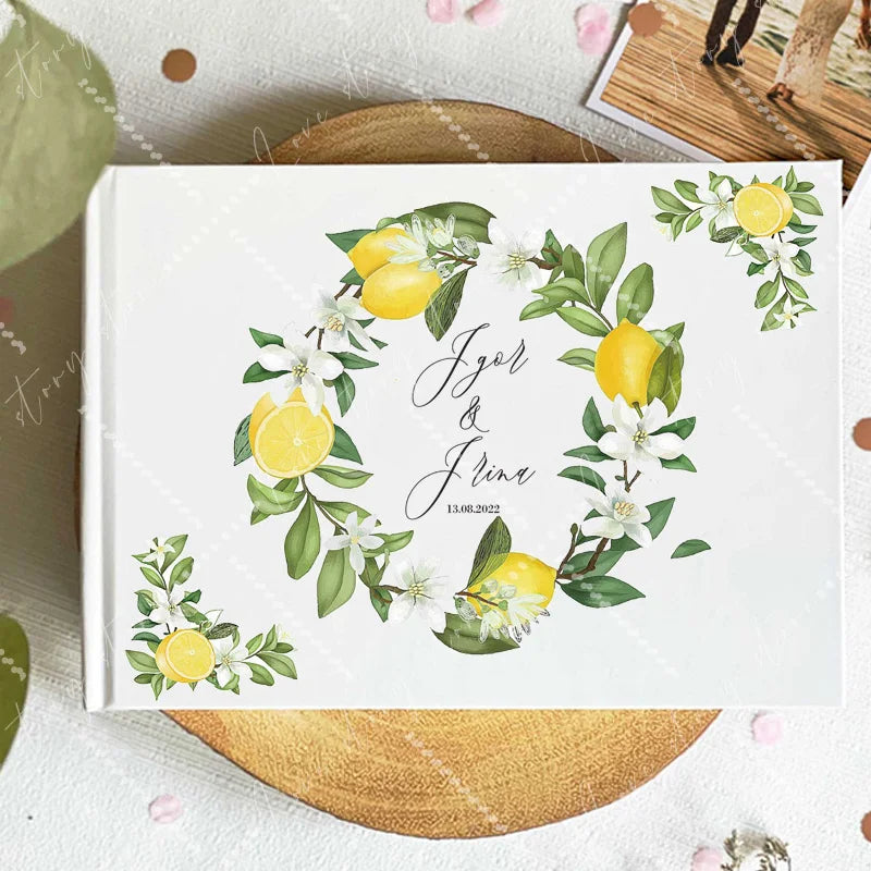 Wedding guest book cover with lemon-yellow fruit branches; couple names and date 13.08.2022