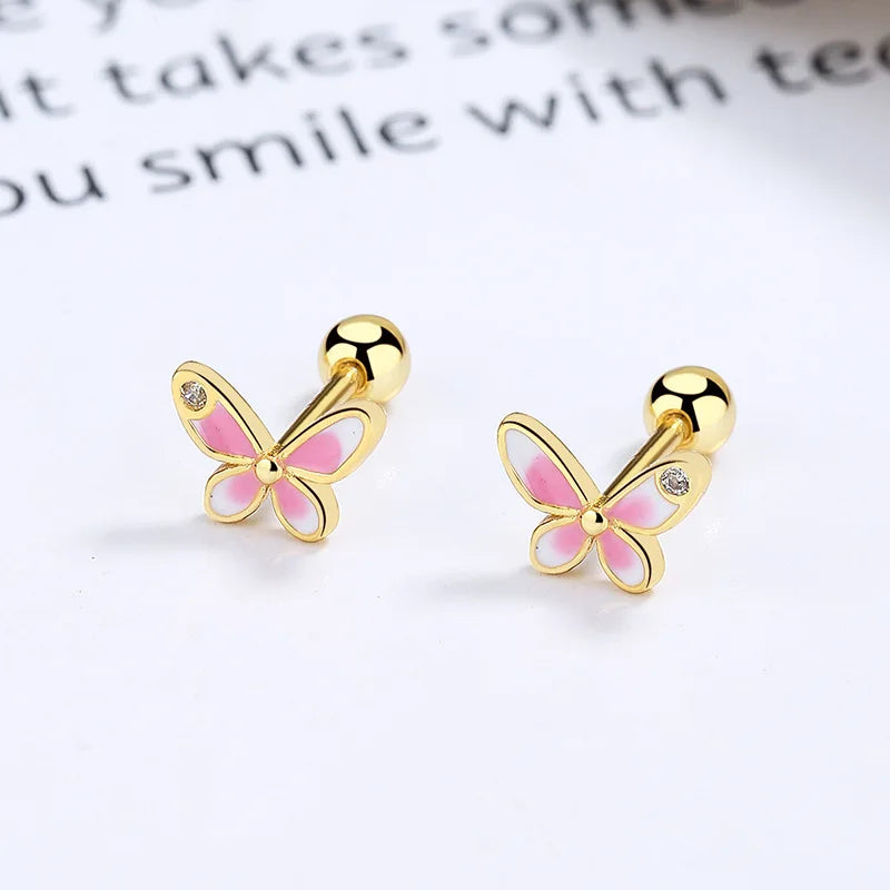 Gold-tone butterfly stud earrings with pink enamel and clear stone accents