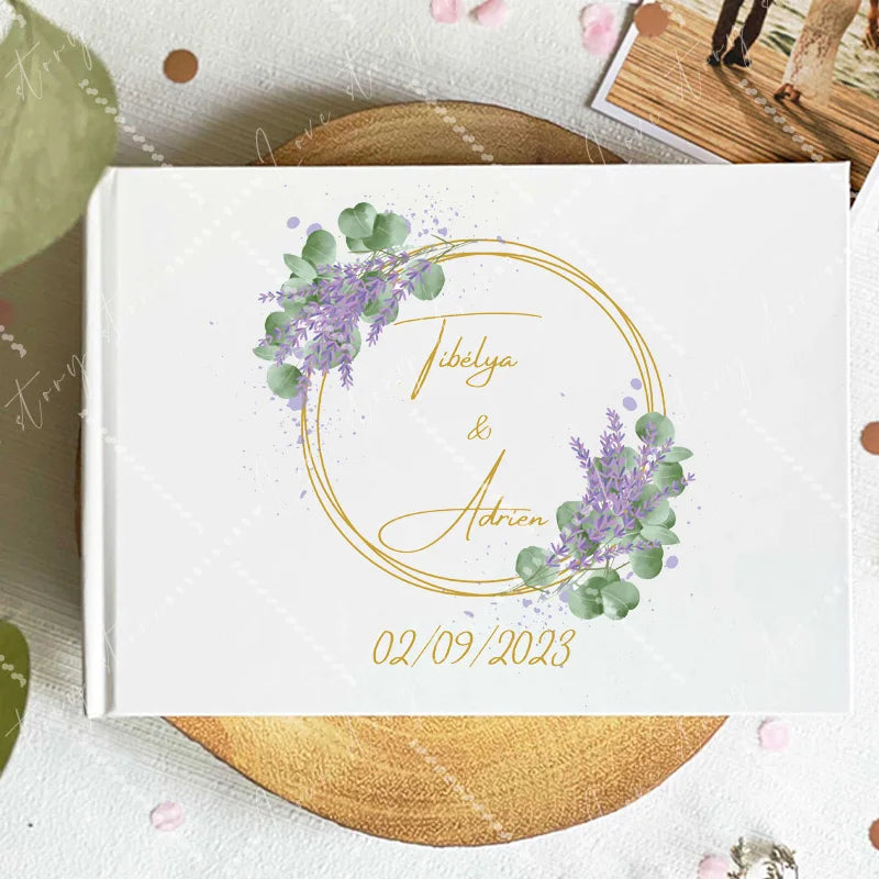 Wedding guest book cover with purple lavender wreath and gold script names; 02/09/2023