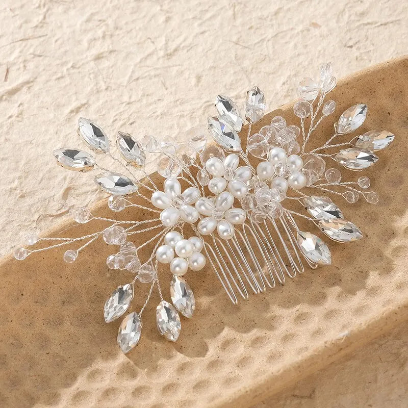 Bridal hair comb with pearl center, clear crystal leaves, and long comb tines