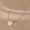 Gold-tone chain necklace with white five-petal pearl flower pendant
