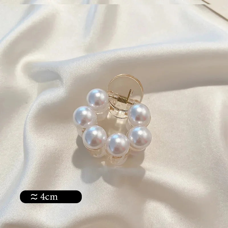 Mini pearl cluster hair claw clip with glossy faux pearls and clear prongs