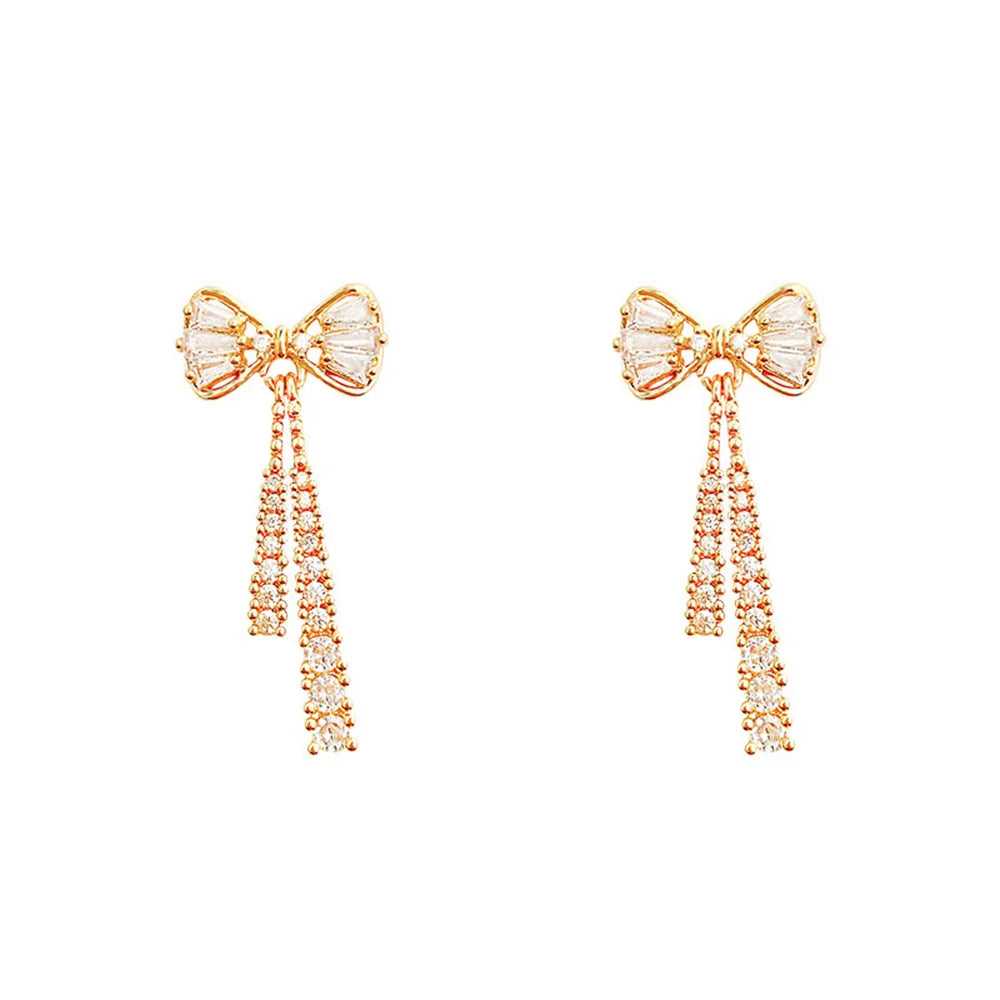 Gold-tone bow drop earrings with vertical crystal fringe tassels
