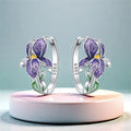 Sterling silver huggie earrings with purple iris flower and green leaf enamel, pair