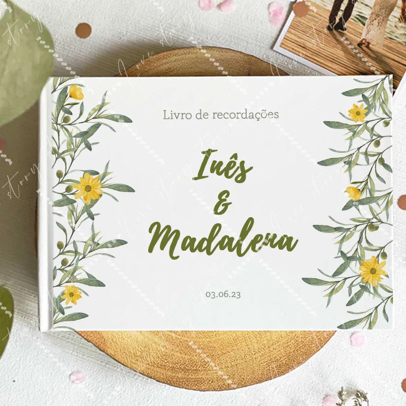 Wedding guest book cover with yellow daisies and green leaves; names and date 03.06.23