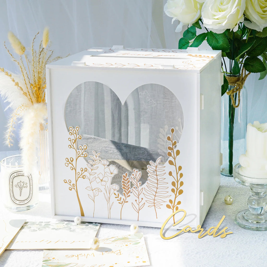 White card box with botanical heart window, gold foil leaves, and clear acrylic front