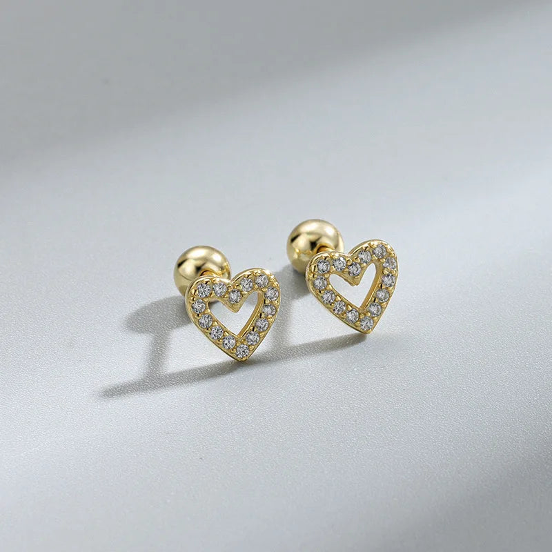 Gold heart stud earrings with clear sparkle stones