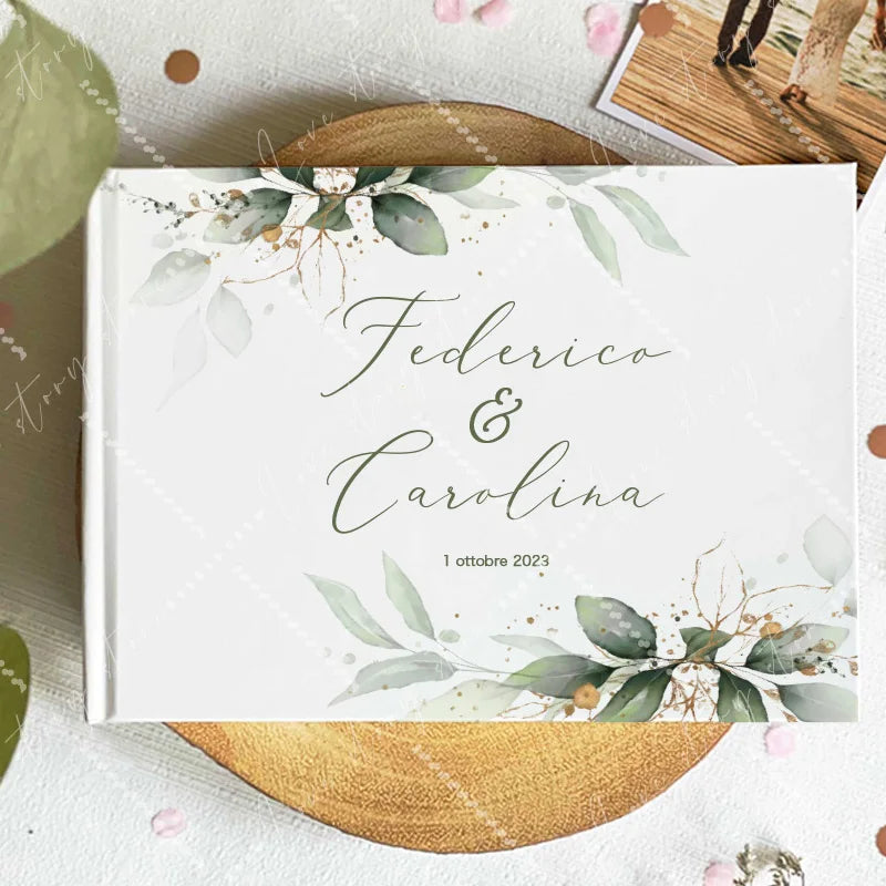 Wedding guest book cover with watercolor eucalyptus leaves and branches; names and date 1 October 2023