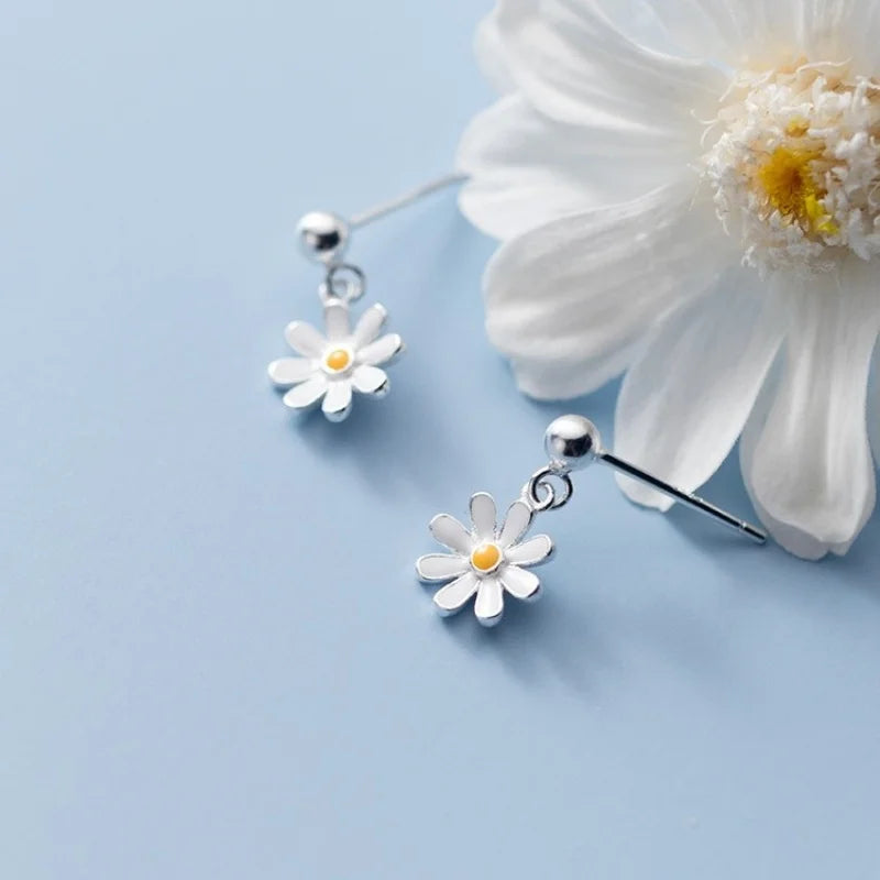 Daisy flower drop earrings with silver hooks, white petals and yellow centers