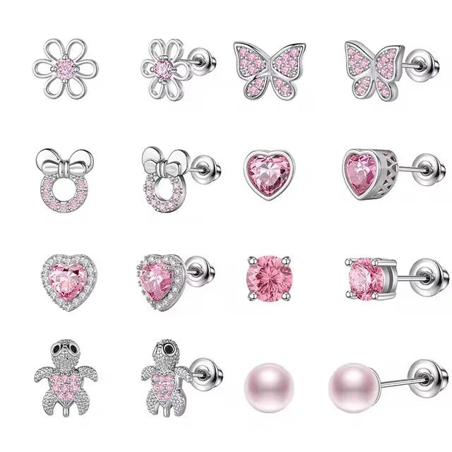 Flower-shaped sparkle stud earrings with pink crystal center in silver-tone setting