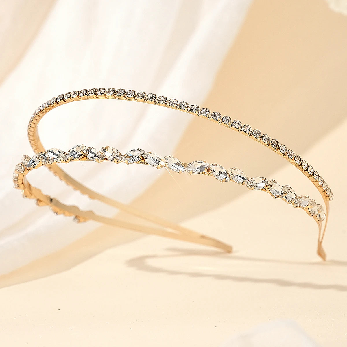 Celine gold double crystal headband featuring clear stones on a slim band