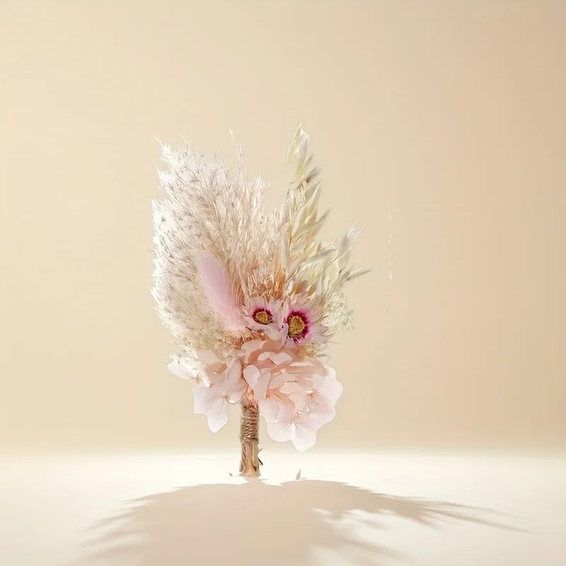 Single dried flower boutonniere with white pampas-style feathers and pink flower accents