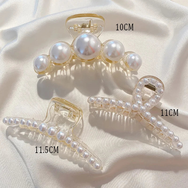 Pearl bead hair claw clip set with clear prongs and golden-toned frame