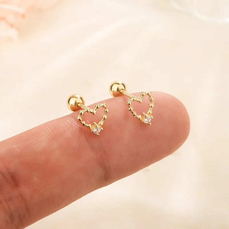 Gold pink stud earrings with small clear sparkle stones