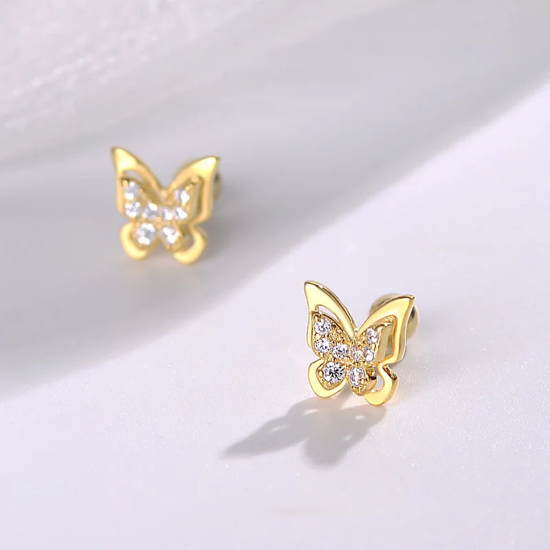 Gold butterfly stud earrings with clear sparkle stones