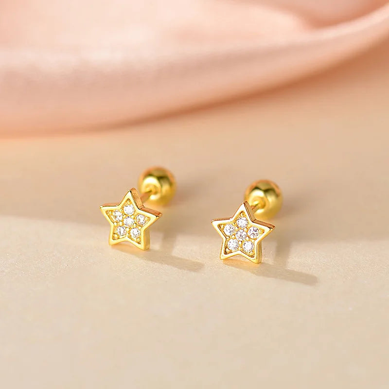 Gold star stud earrings with clear sparkle stones