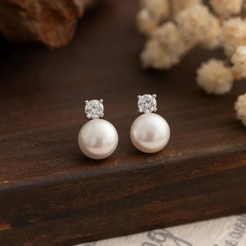 Freshwater pearl stud earrings with square sparkling stone tops and gold-tone posts