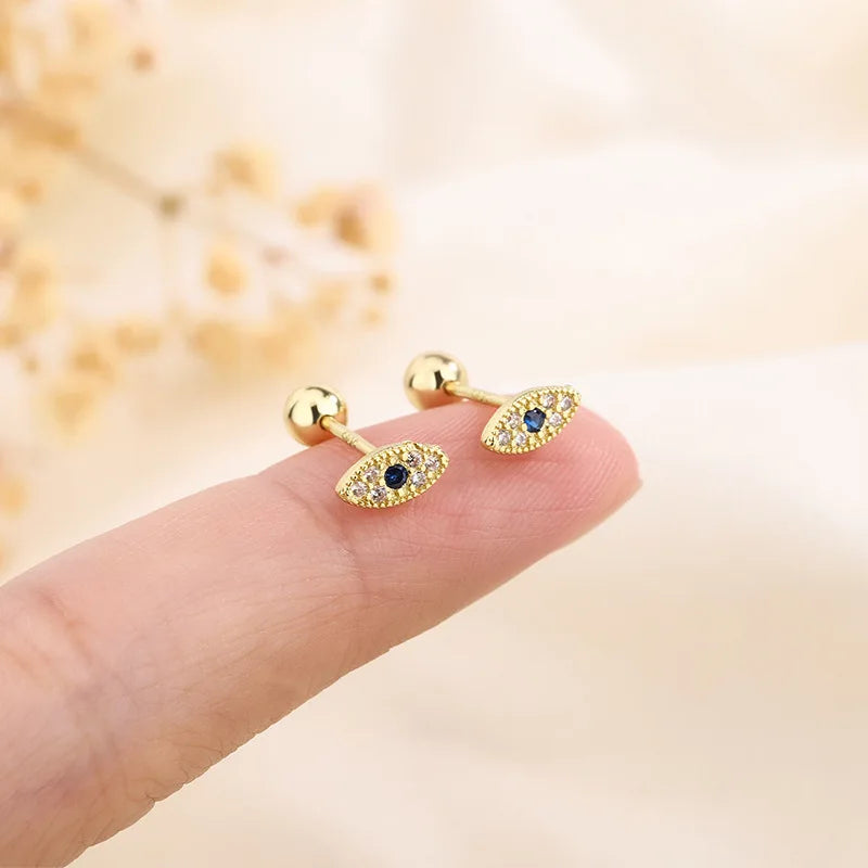 Gold-tone sparkle stud earrings with blue center ovals and crystal borders