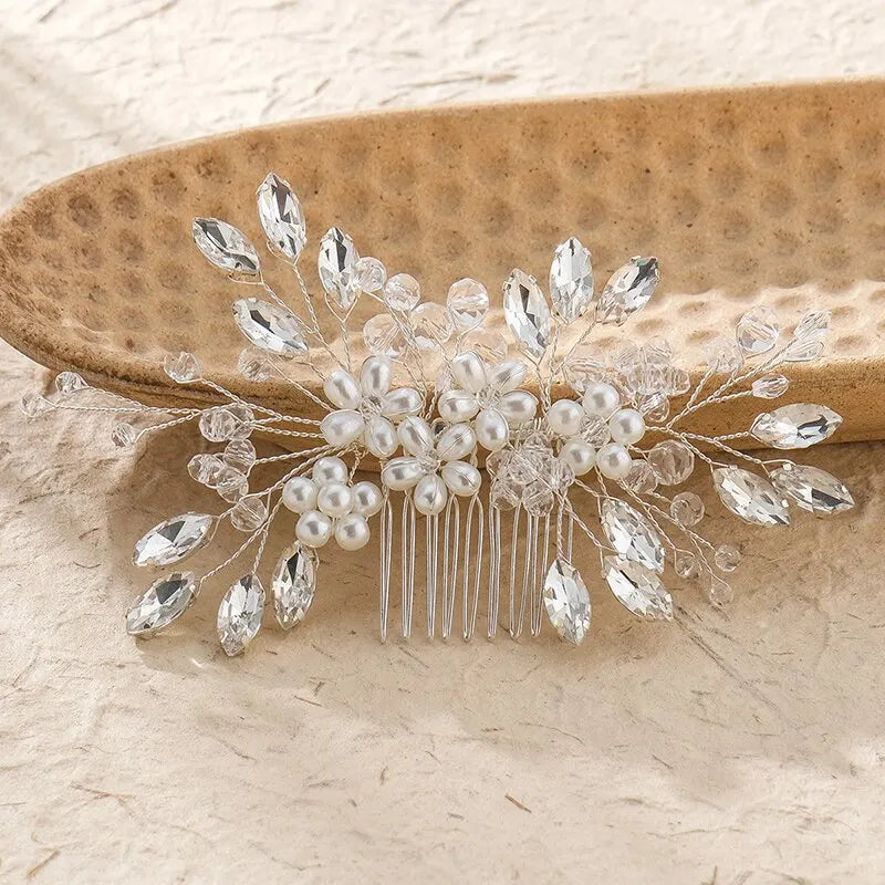 Bridal hair comb featuring pearl beads, crystal leaf branches, and five-prong comb base