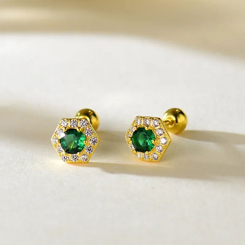 Gold hexagon stud earrings with green center stones and clear accents